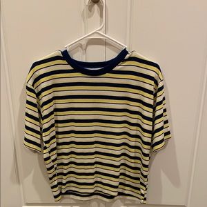 yellow, navy blue, white and black tee
